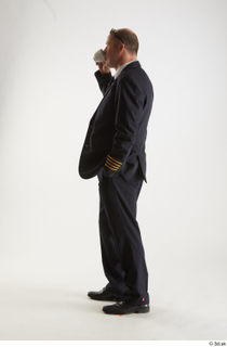 Jake Perry Pilot Drinking Coffee drinking standing whole body 0006.jpg